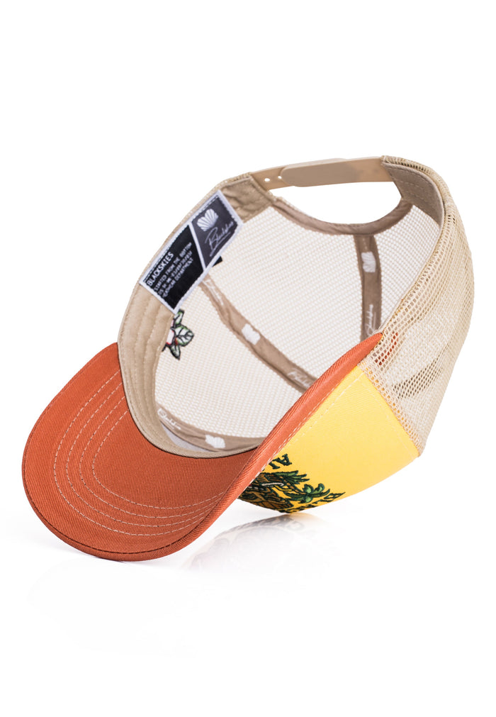 Trucker hat with orange front panel, yellow side panel, and beige mesh back on a white background