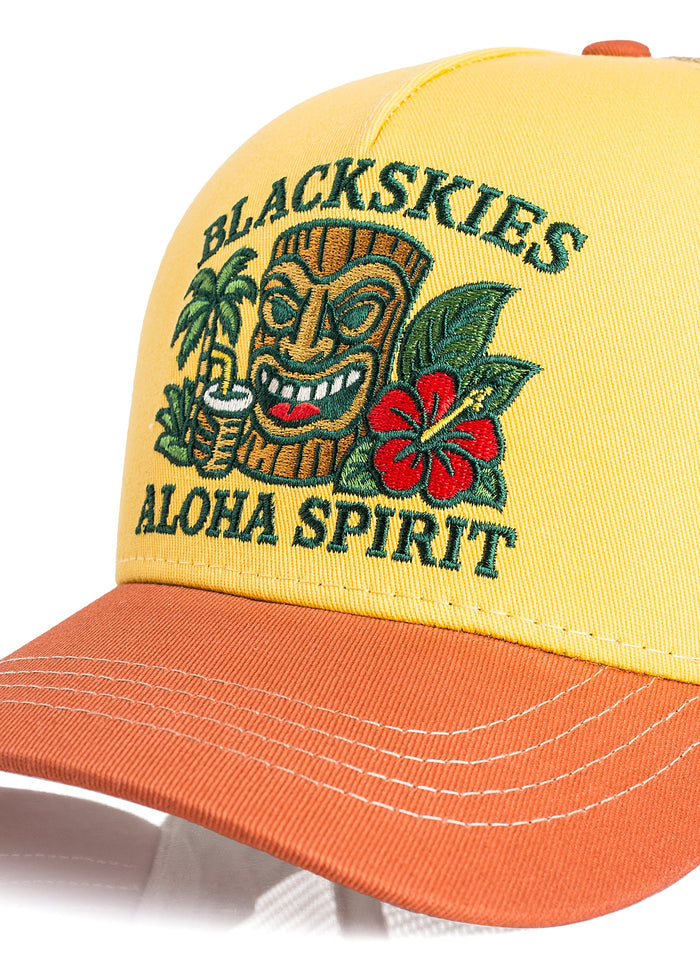 Yellow and orange cap with 'Blackskies Aloha Spirit' design on a white background